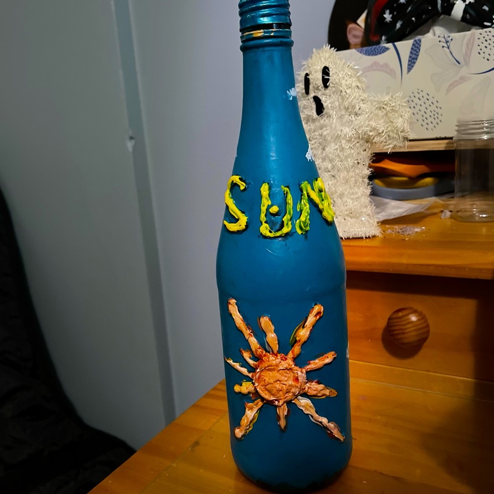 Sun themed custom painted bottle
